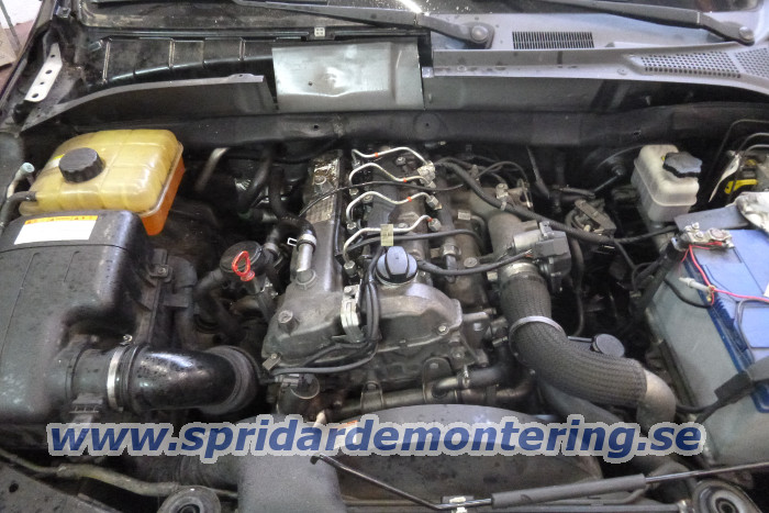 En skadad spridare tas ut ur Ssang Yong Kyron
                med 2.0 XDi motor